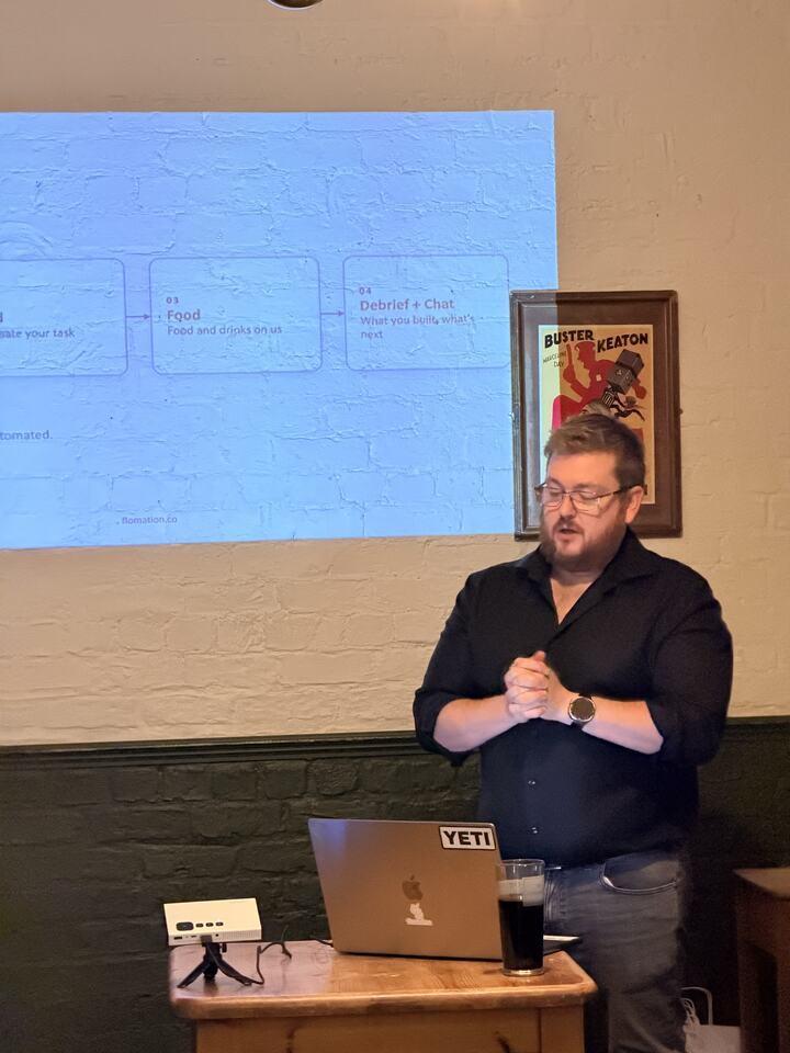 Andy introducing the evening in front of a projected agenda